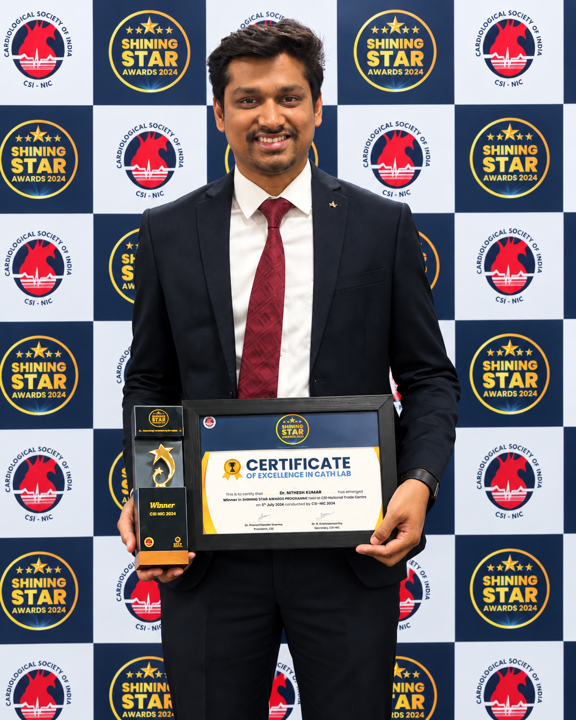 Dr. Nithesh Kumar receiving Certificate of Excellence in Cath Lab - Shining Star Awards